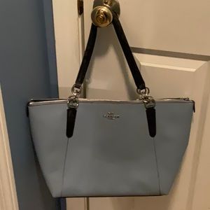 Blue Coach tote with matching wallet.